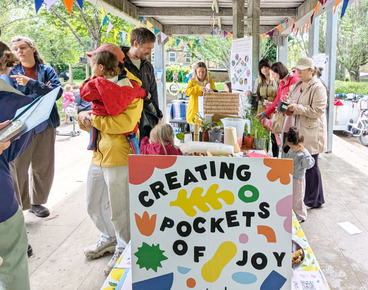 LMC Summer Gathering - a table, bunting, colour, people, families